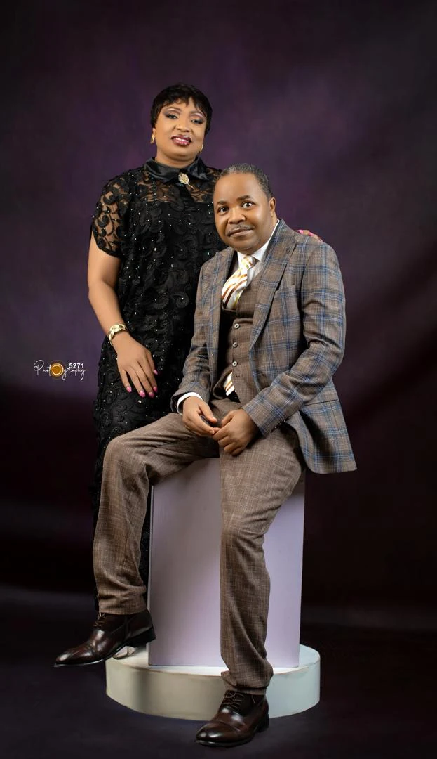 Reverend Dr. Adamson Aromaegbe and his wife, photographed together.